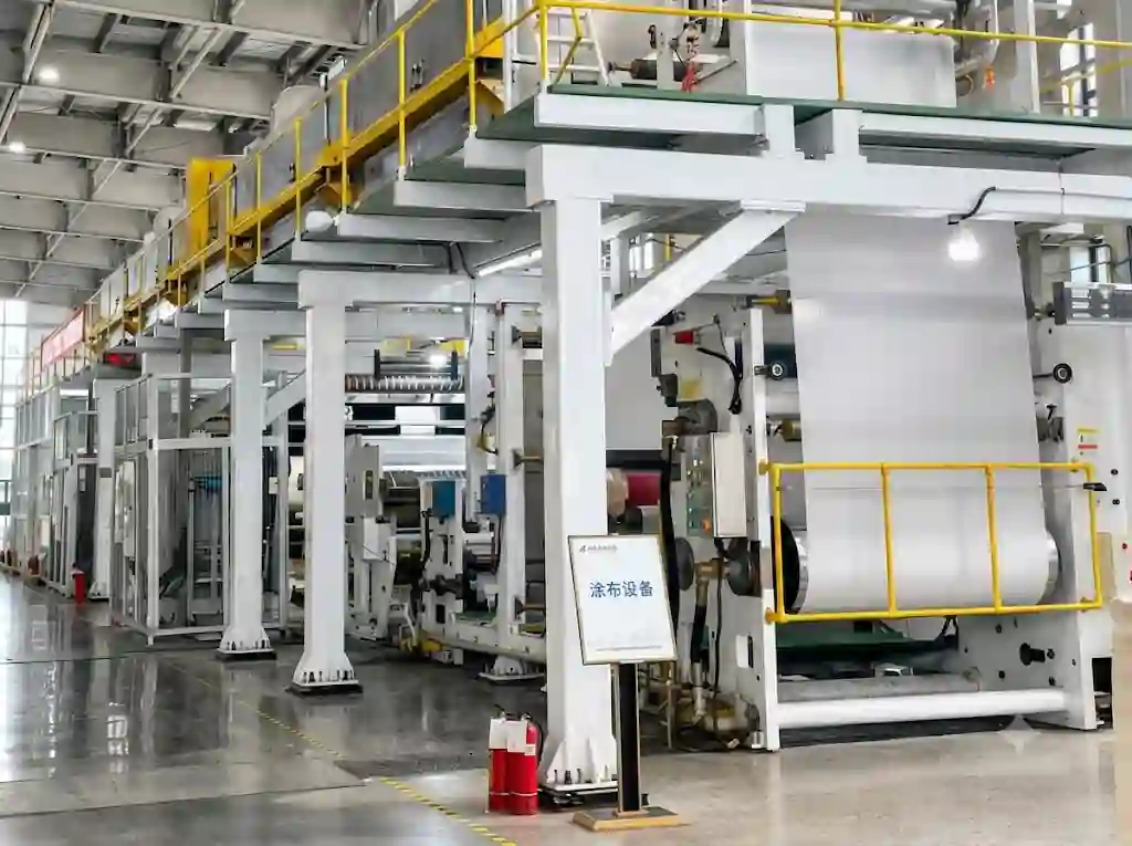 industrial-coating-production-equipment Large coating machine inside a label material factory