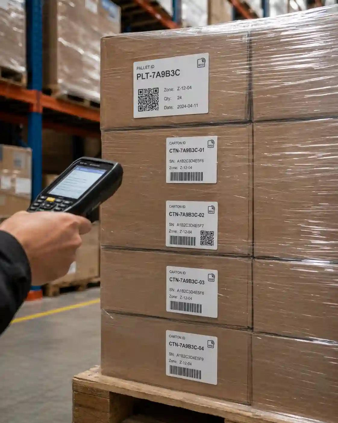 hypaper-electronics-logistics-carton-pallet-shipping-label Scanning Hy paper logistics shipping barcode label on a shrink-wrapped pallet of electronic goods.